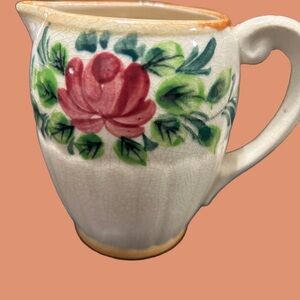Floral Ceramic Pitcher with Red and Green Design